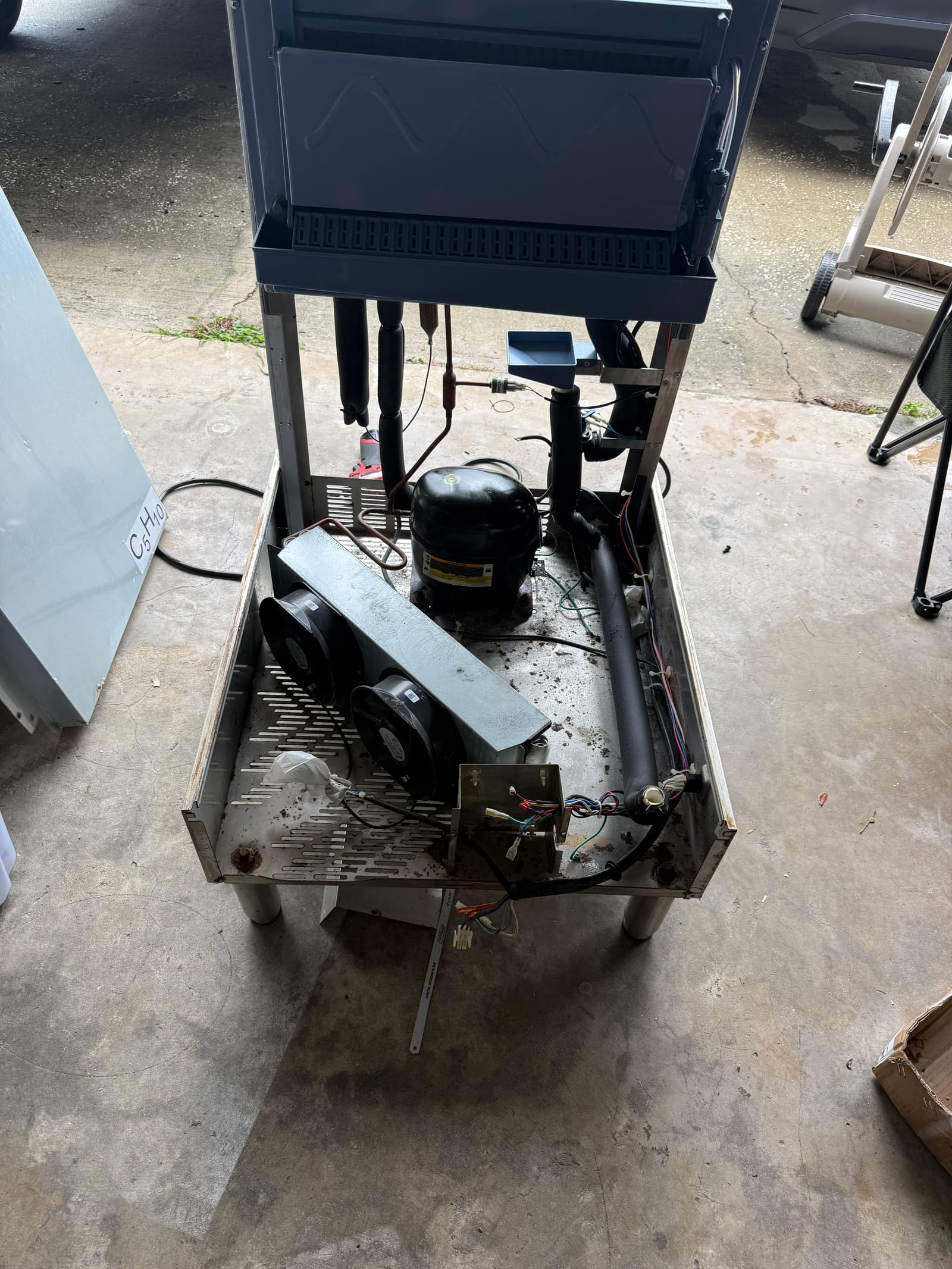 Rebuilt interior of the Atosa ice machine with new control board, fans, and start relay installed
