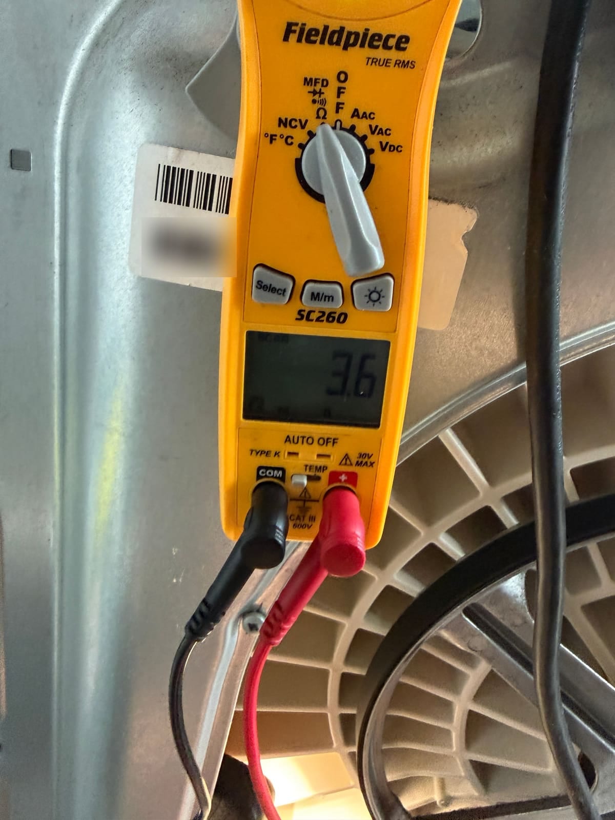Meter reading a normal resistance across the Electrolux washer motor windings