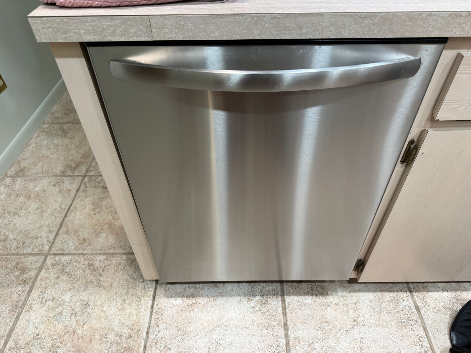 Stainless Frigidaire dishwasher built into a kitchen island near Sleepy Hollow, Dunedin