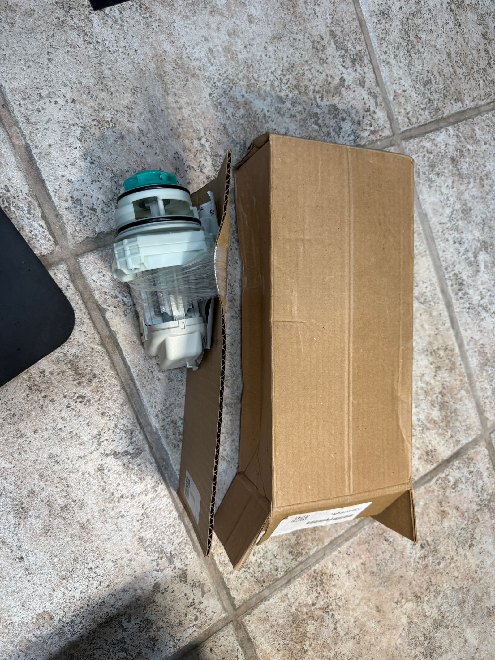 New Frigidaire circulation pump still in its packaging