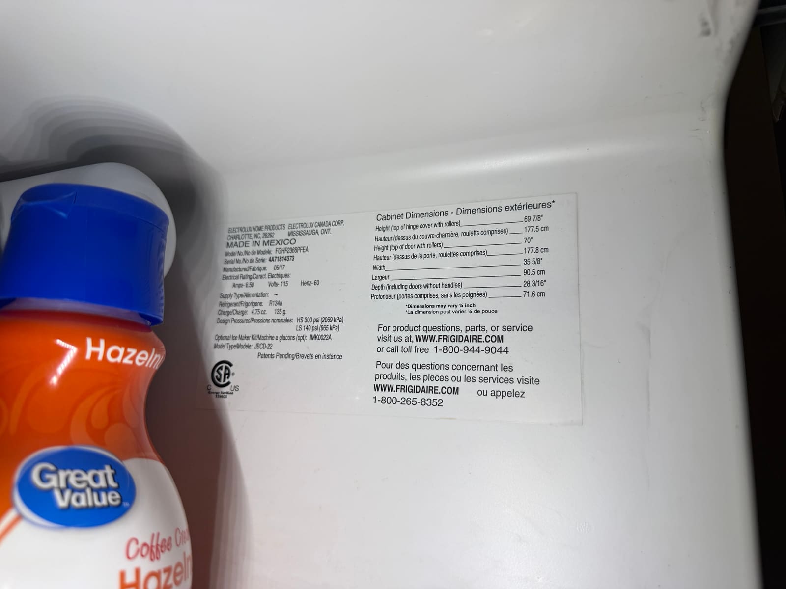 Frigidaire data plate showing model FGHF2366PFEA, manufactured 05/17