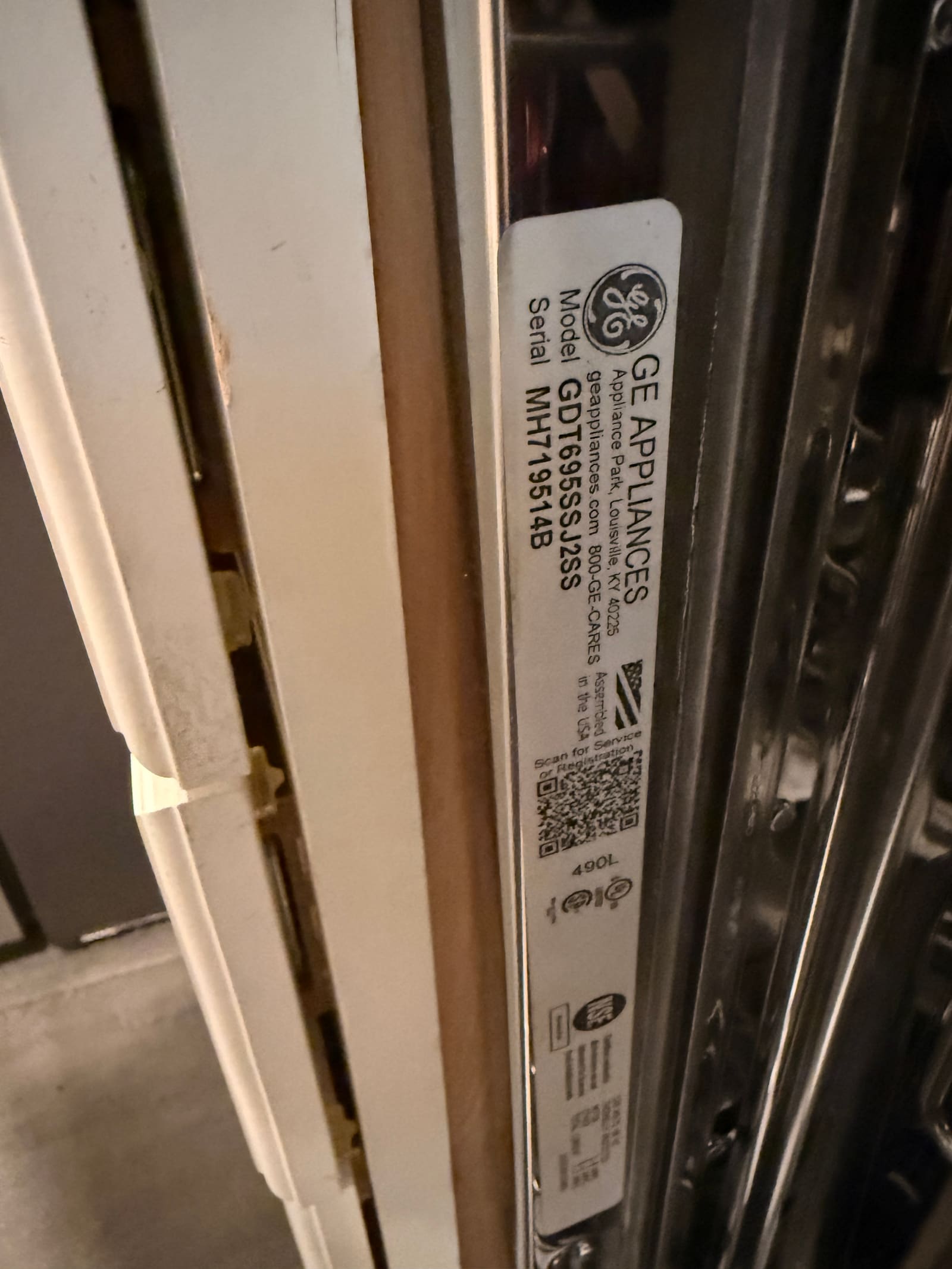 GE dishwasher data plate showing model GDT695SSJ2SS