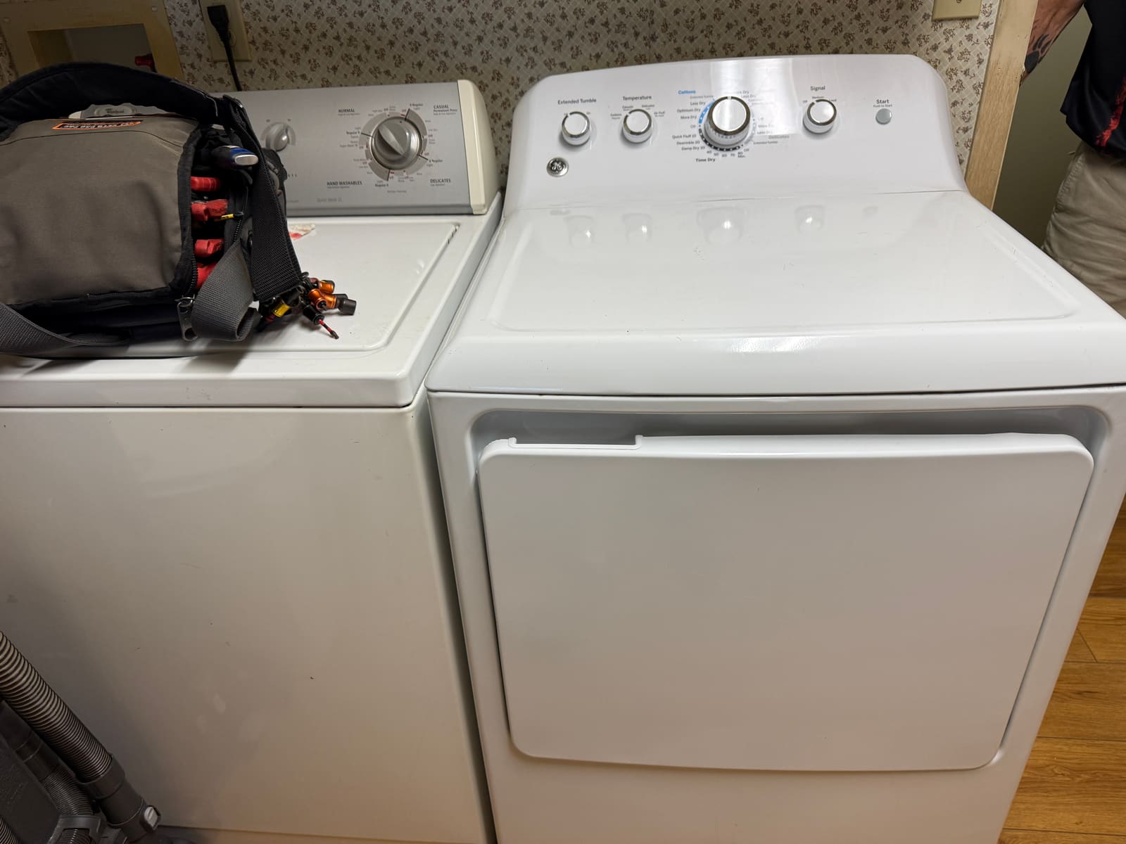 GE dryer next to a washer in a laundry room in Paradise Park, Largo