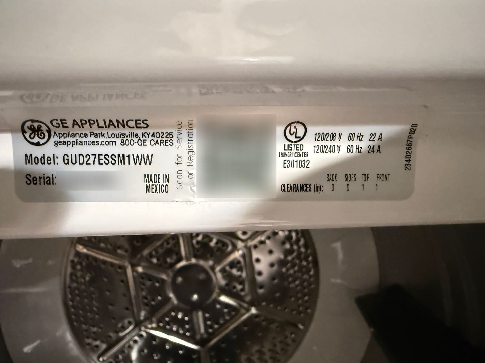 GE Appliances data plate on a laundry center showing model GUD27ESSM1WW