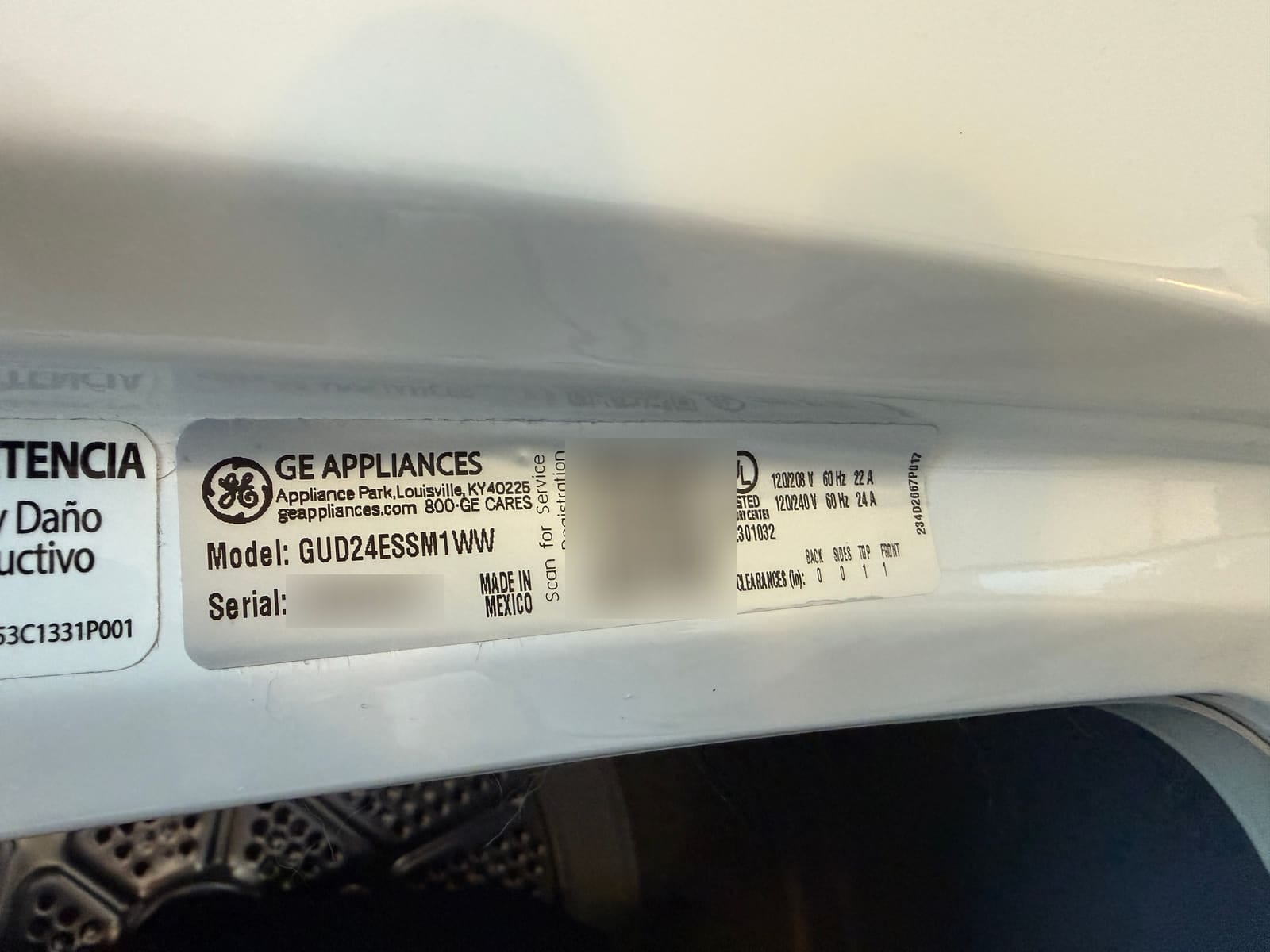 GE Appliances data plate on a laundry center showing model GUD24ESSM1WW