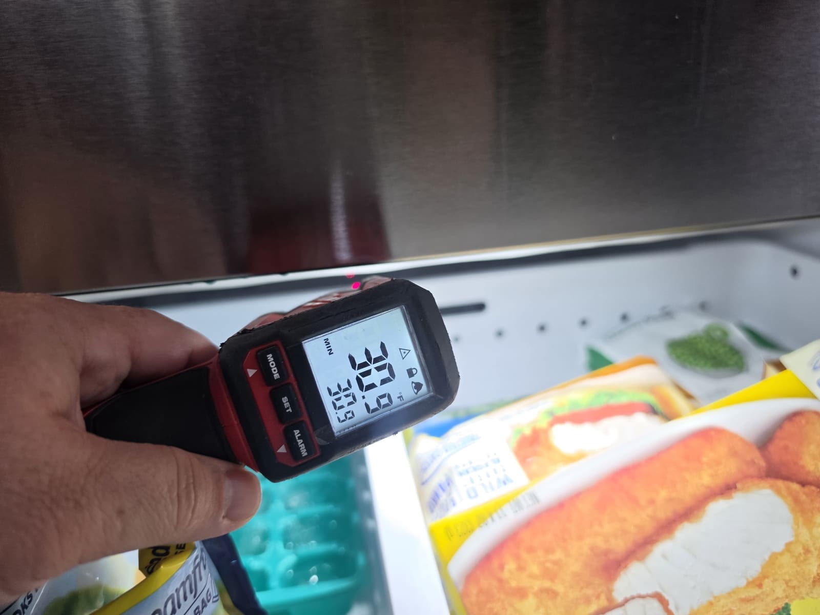 Infrared thermometer reading about 31 degrees Fahrenheit in the GE Profile freezer drawer
