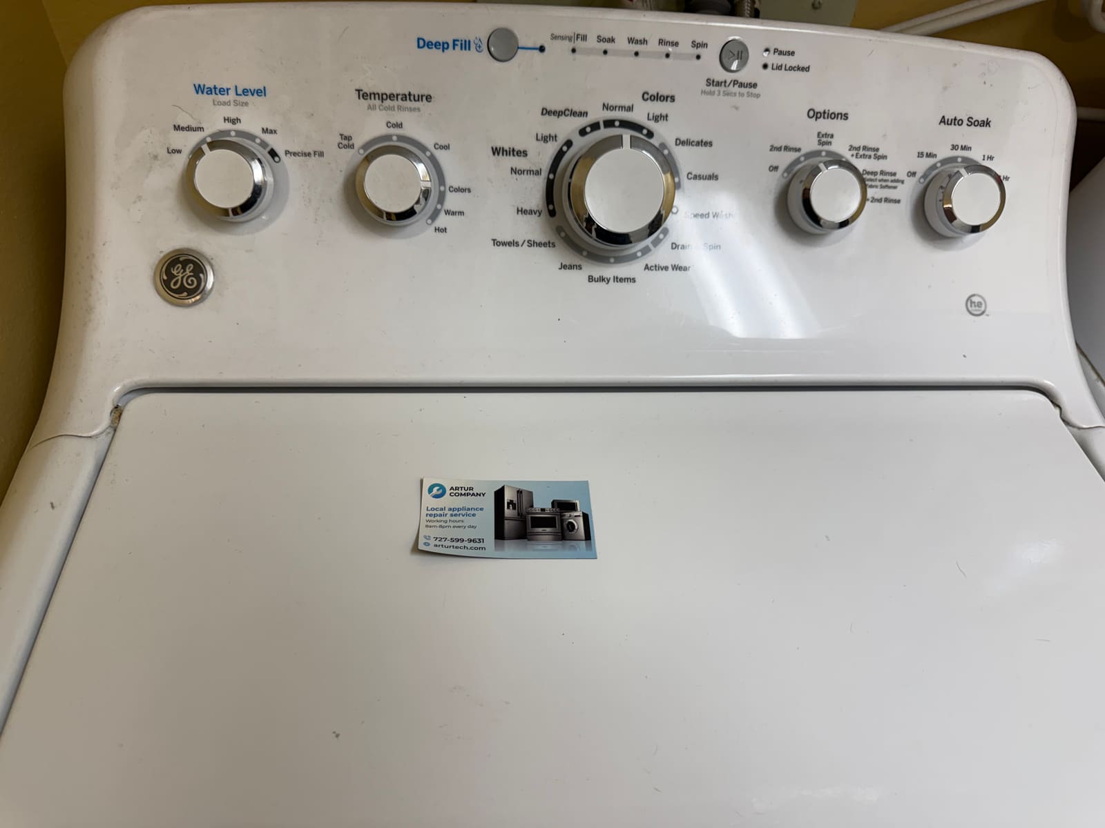 GE washer control panel reassembled with all knobs back in place