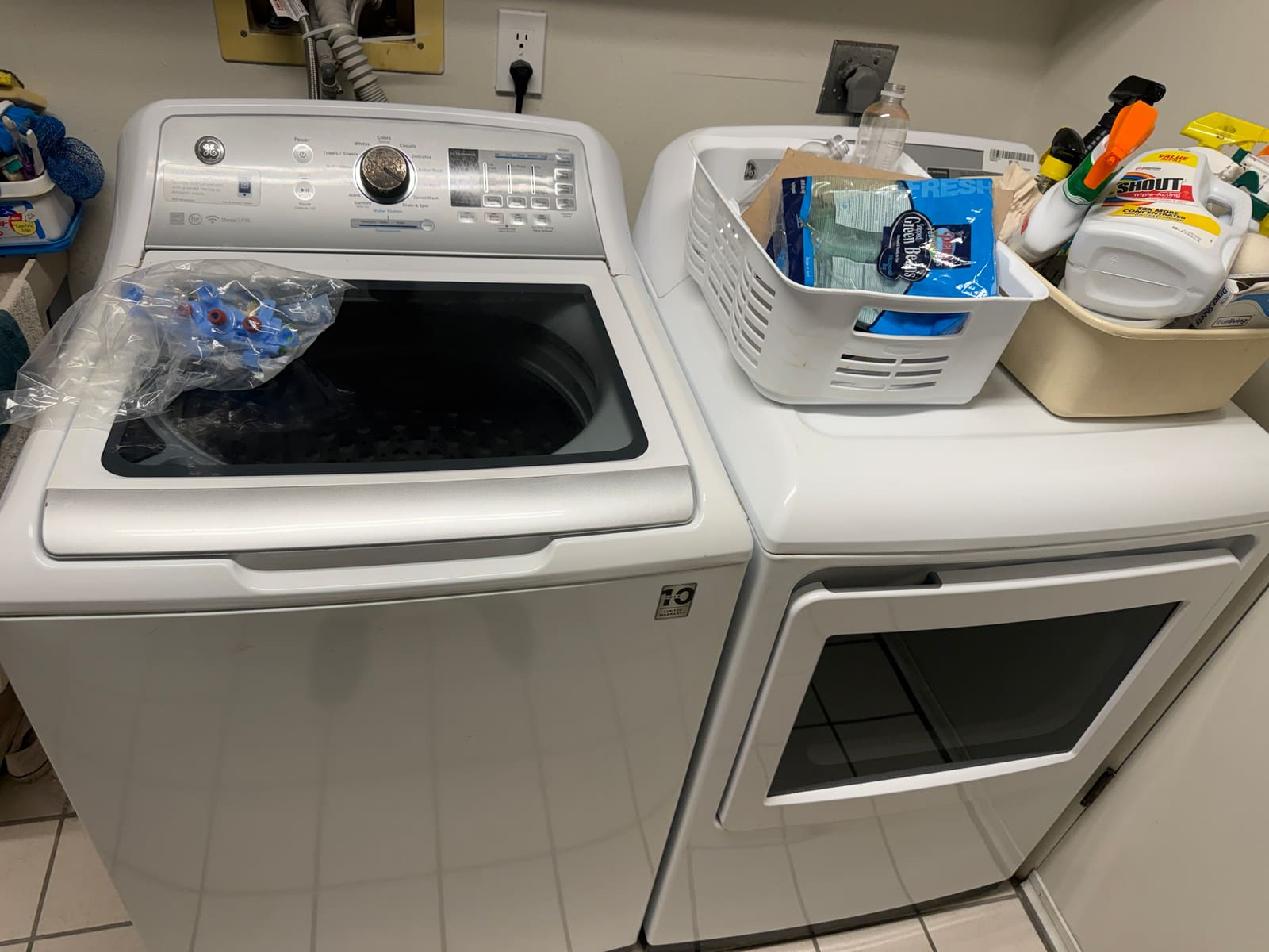 GE top-load washer and dryer set in a laundry room in Clearwater