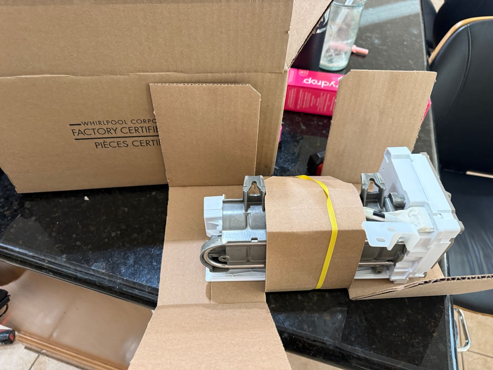 New ice maker unpacked from its genuine Whirlpool service parts box