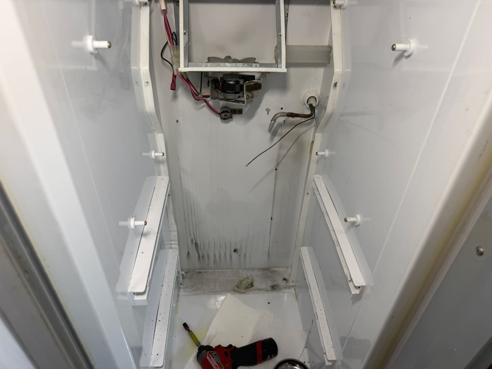Freezer cavity opened up with the old evaporator removed