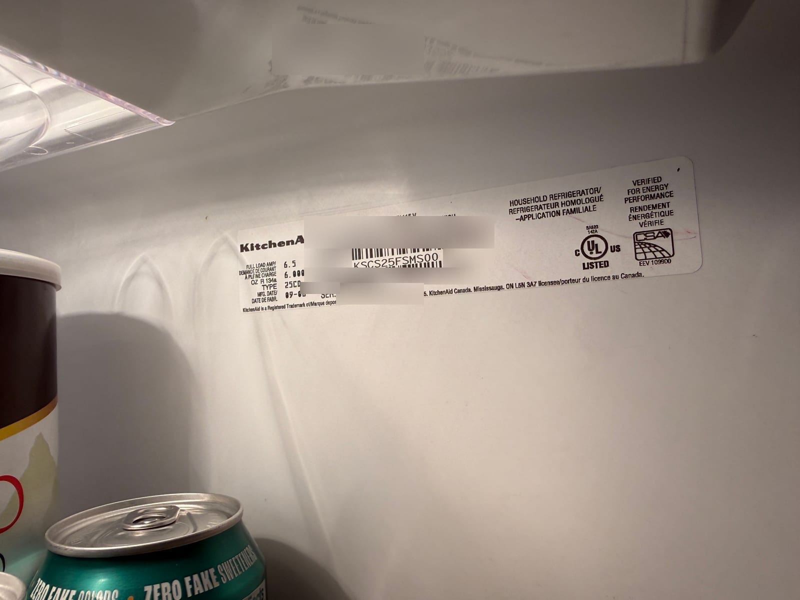 KitchenAid refrigerator data plate with model KSCS25FSMS00 readable; serial number and barcodes blurred