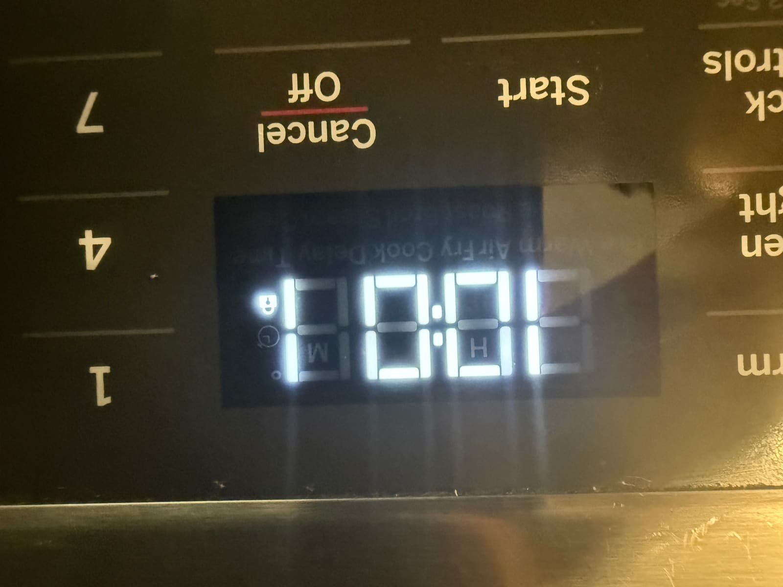 LG range control panel display showing the lock icon active