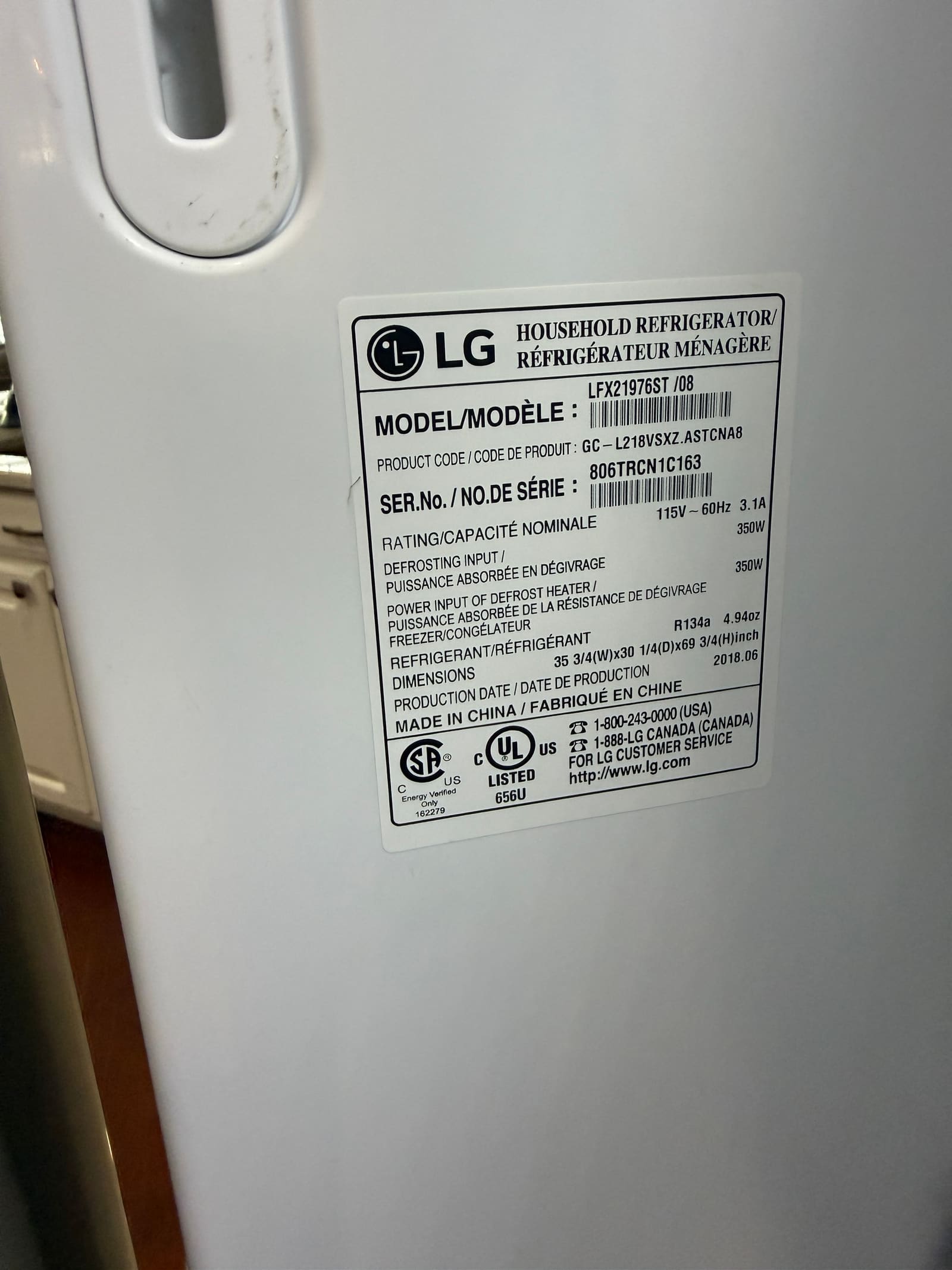 LG refrigerator data plate showing model LFX21976ST