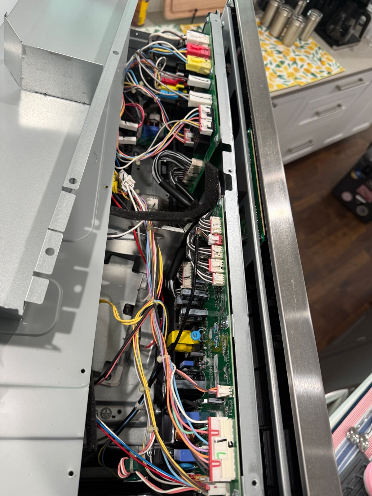 Control boards and wiring along the side of the LG combo wall oven