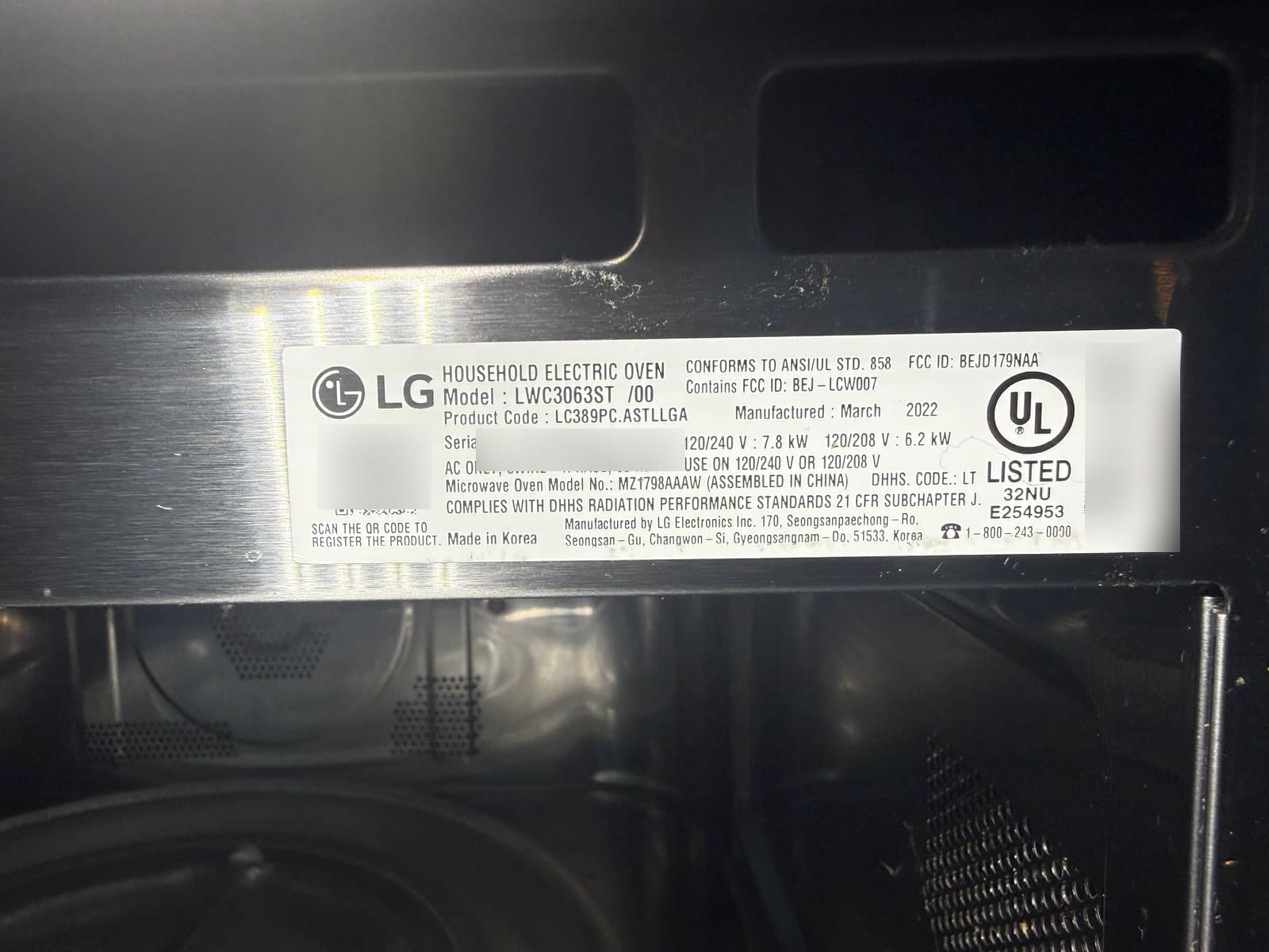LG wall oven data plate showing model LWC3063ST with microwave model MZ1798AAAW