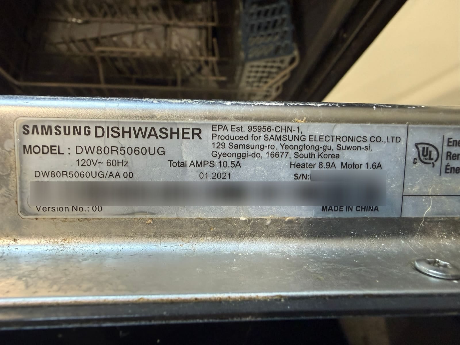 Samsung dishwasher data plate showing model DW80R5060UG