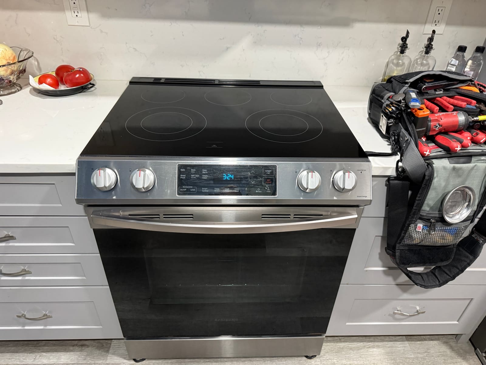 Samsung slide-in electric range with a glass cooktop after the repair, in a kitchen in the Highland Lakes neighborhood of Palm Harbor