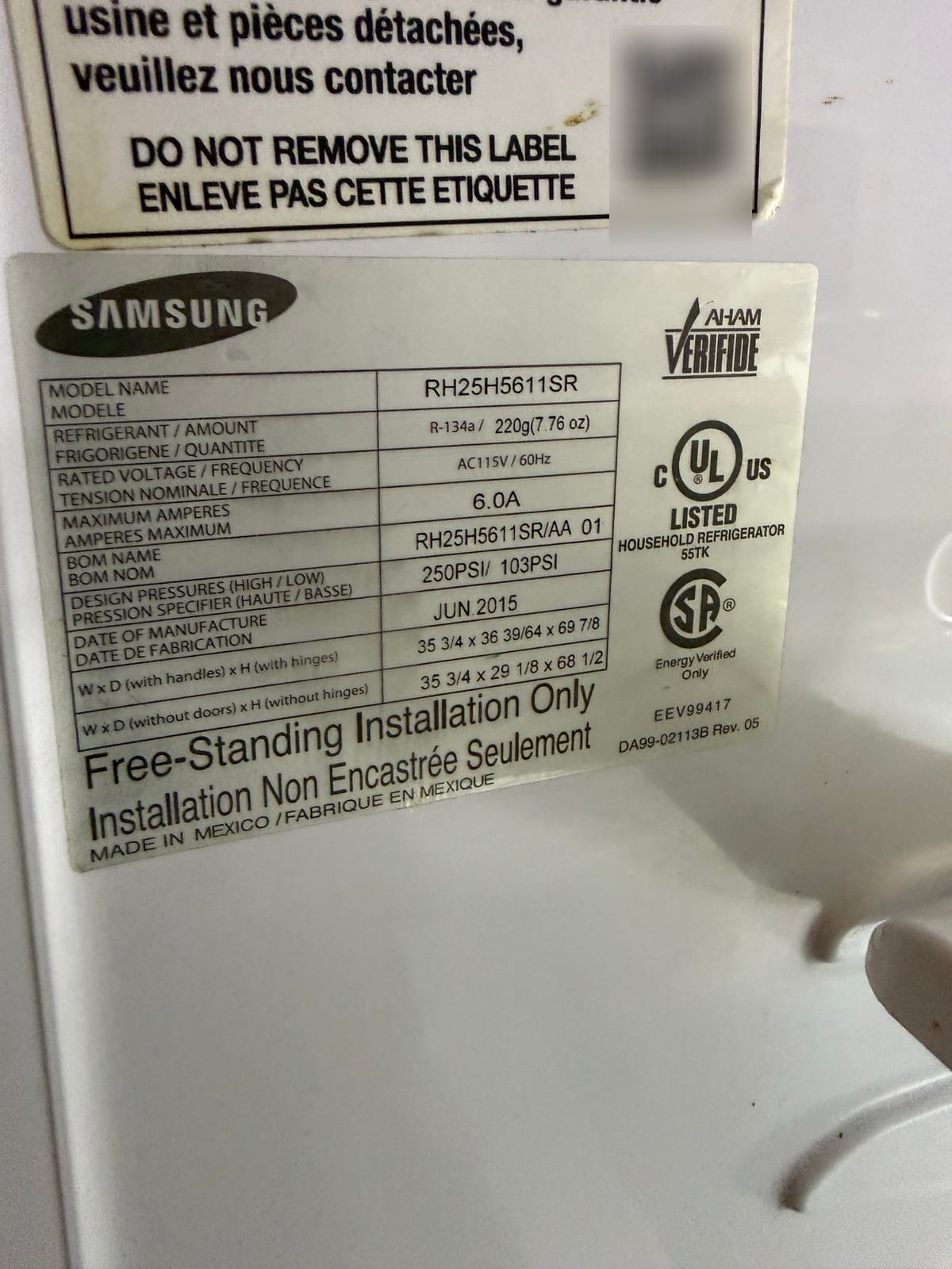 Samsung refrigerator data plate with model RH25H5611SR readable; the QR code on the label above is blurred