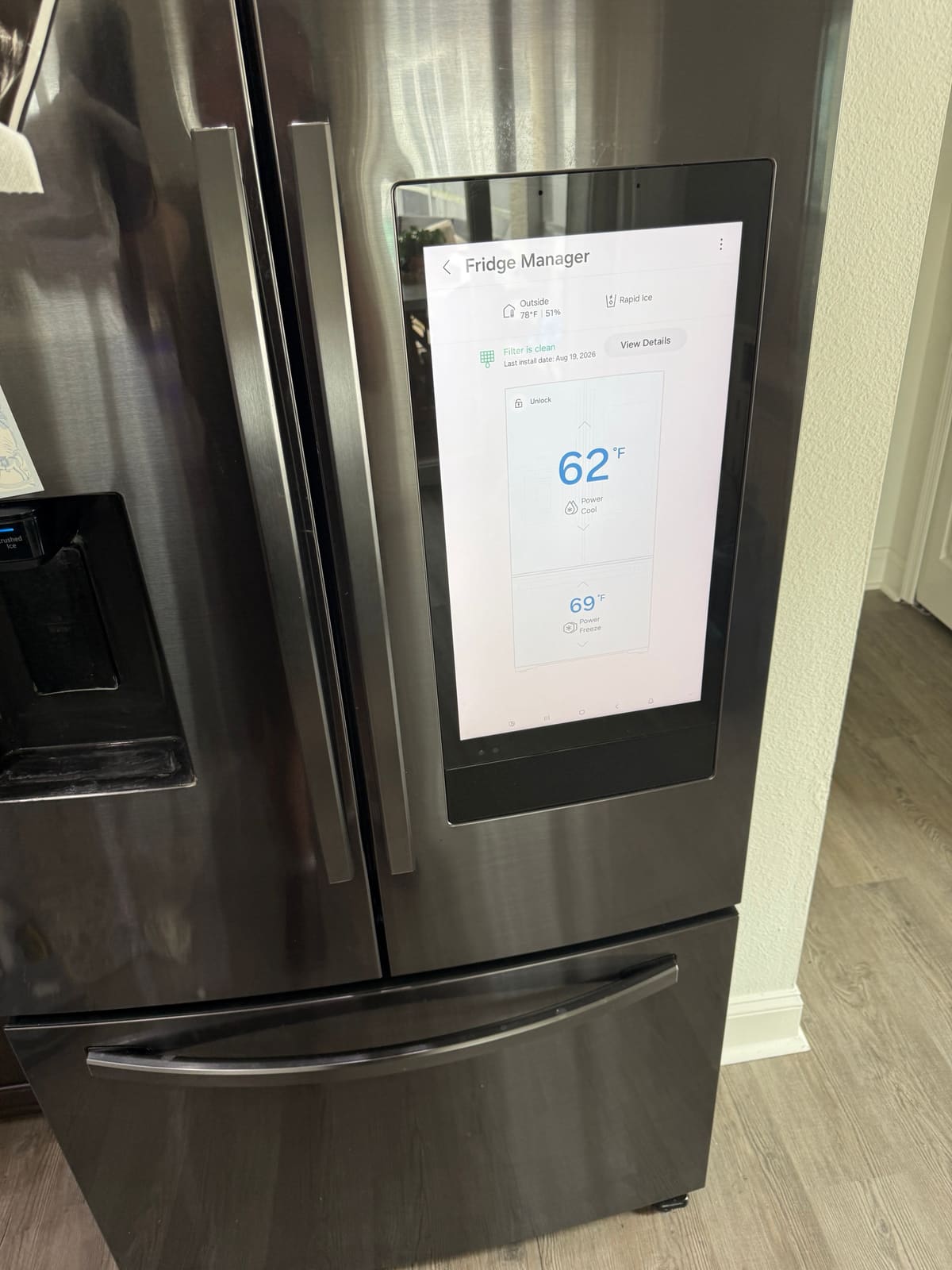 Samsung Family Hub refrigerator screen showing the fridge at 62 degrees and the freezer at 69 degrees in a home in the Westchester neighborhood of Westchase