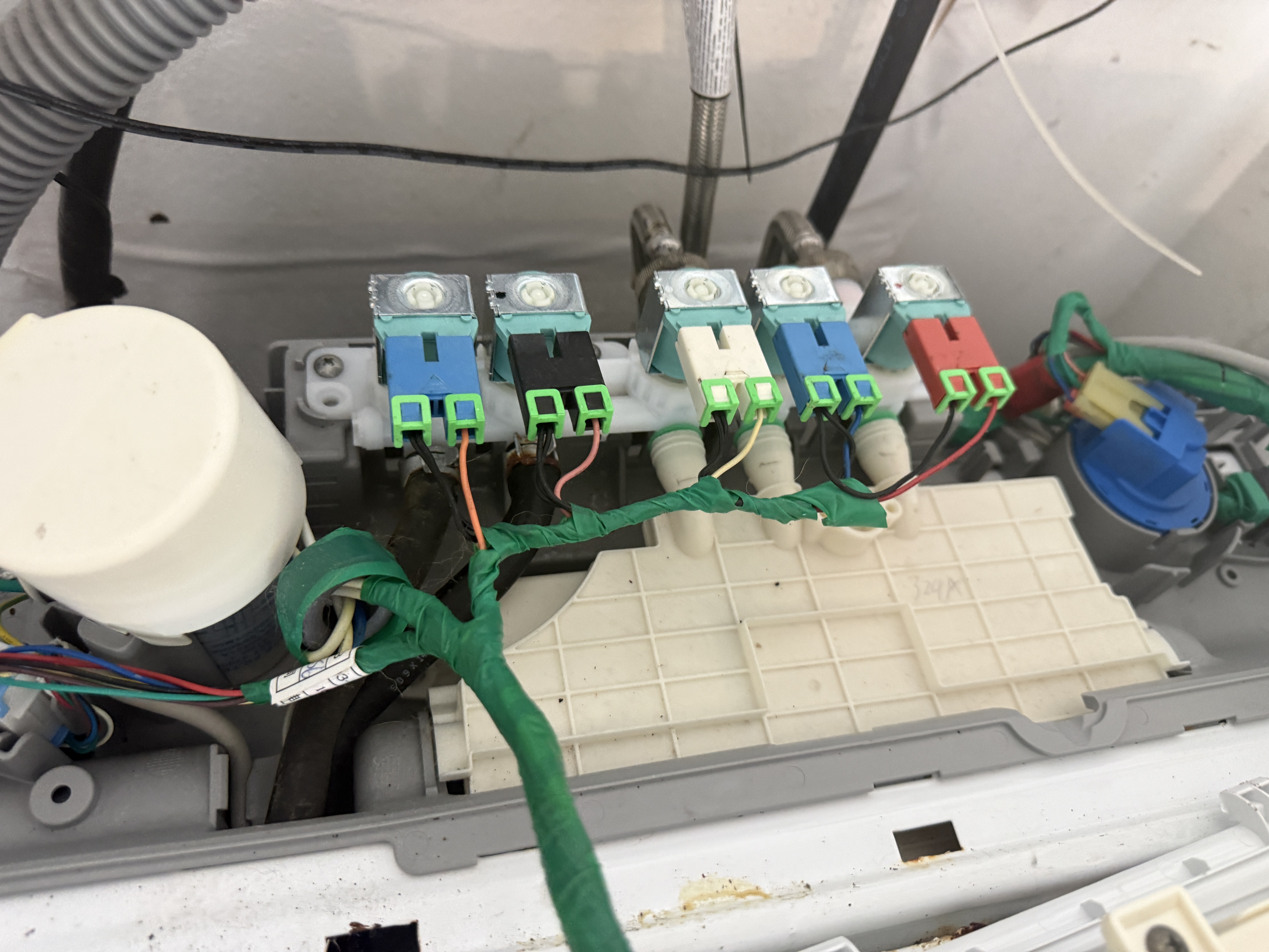 New water inlet valve assembly installed and wired into the Samsung washer
