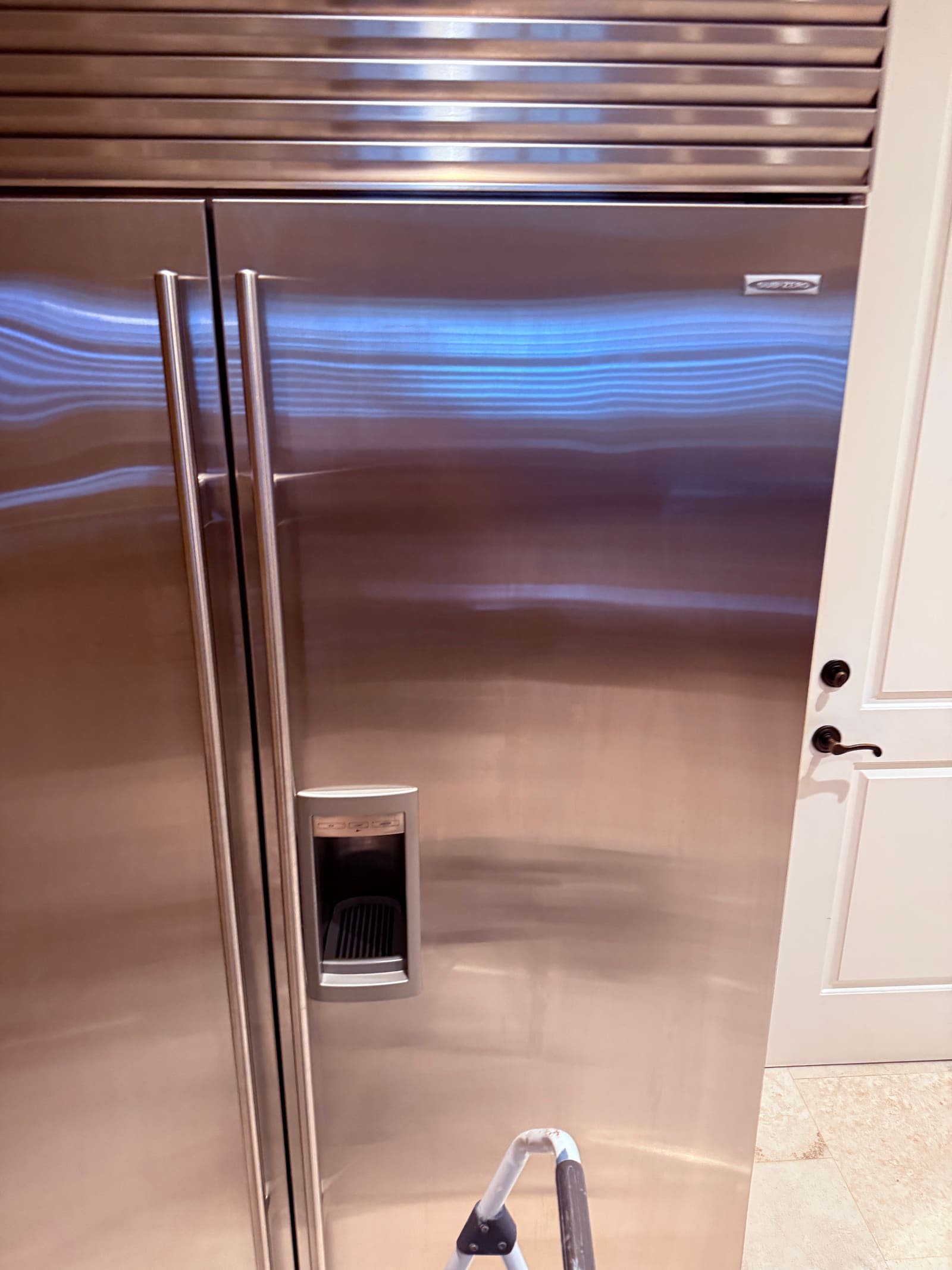Built-in Sub-Zero refrigerator in a kitchen in Davis Islands, Tampa
