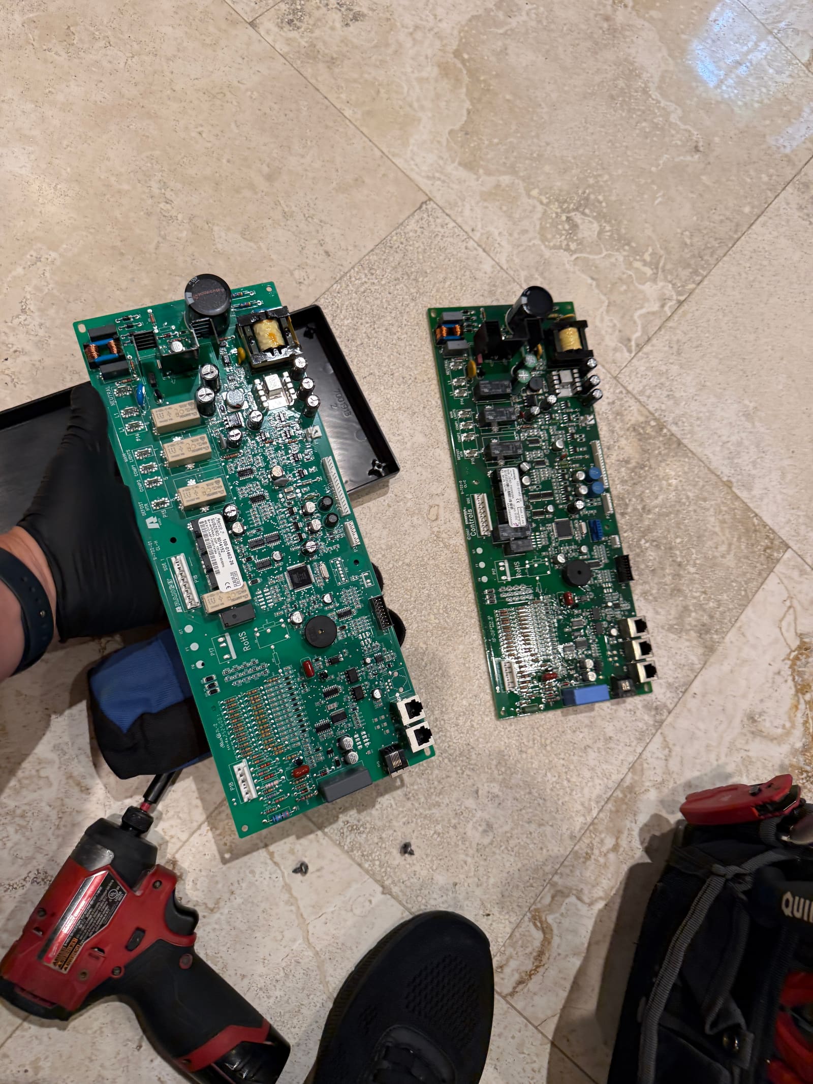 Failed and replacement Sub-Zero control boards side by side