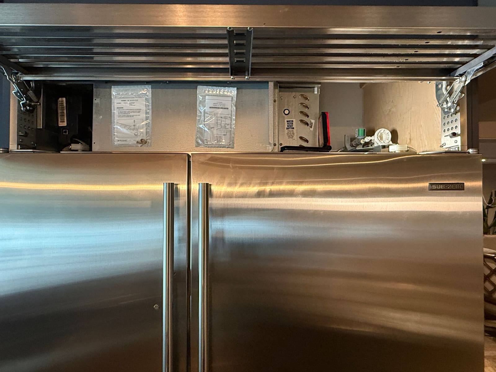 Built-in Sub-Zero side-by-side refrigerator in a kitchen in Clearwater