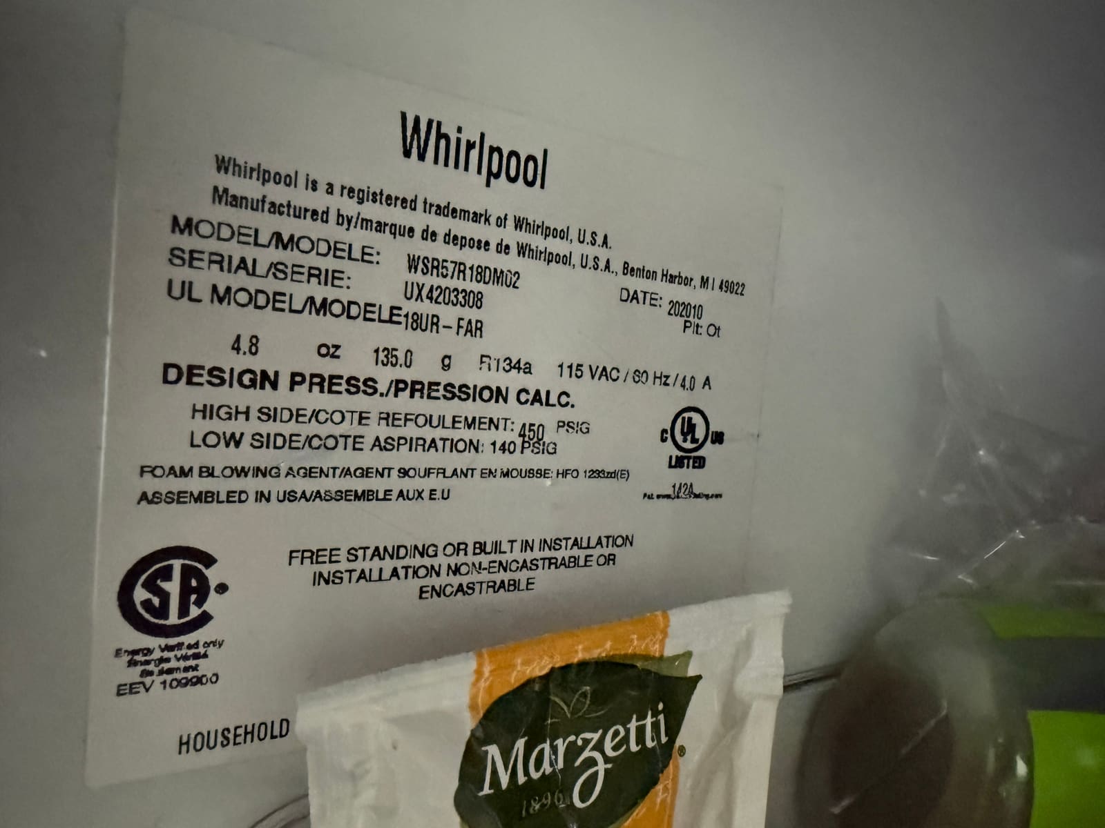Whirlpool data plate showing model WSR57R18DM02
