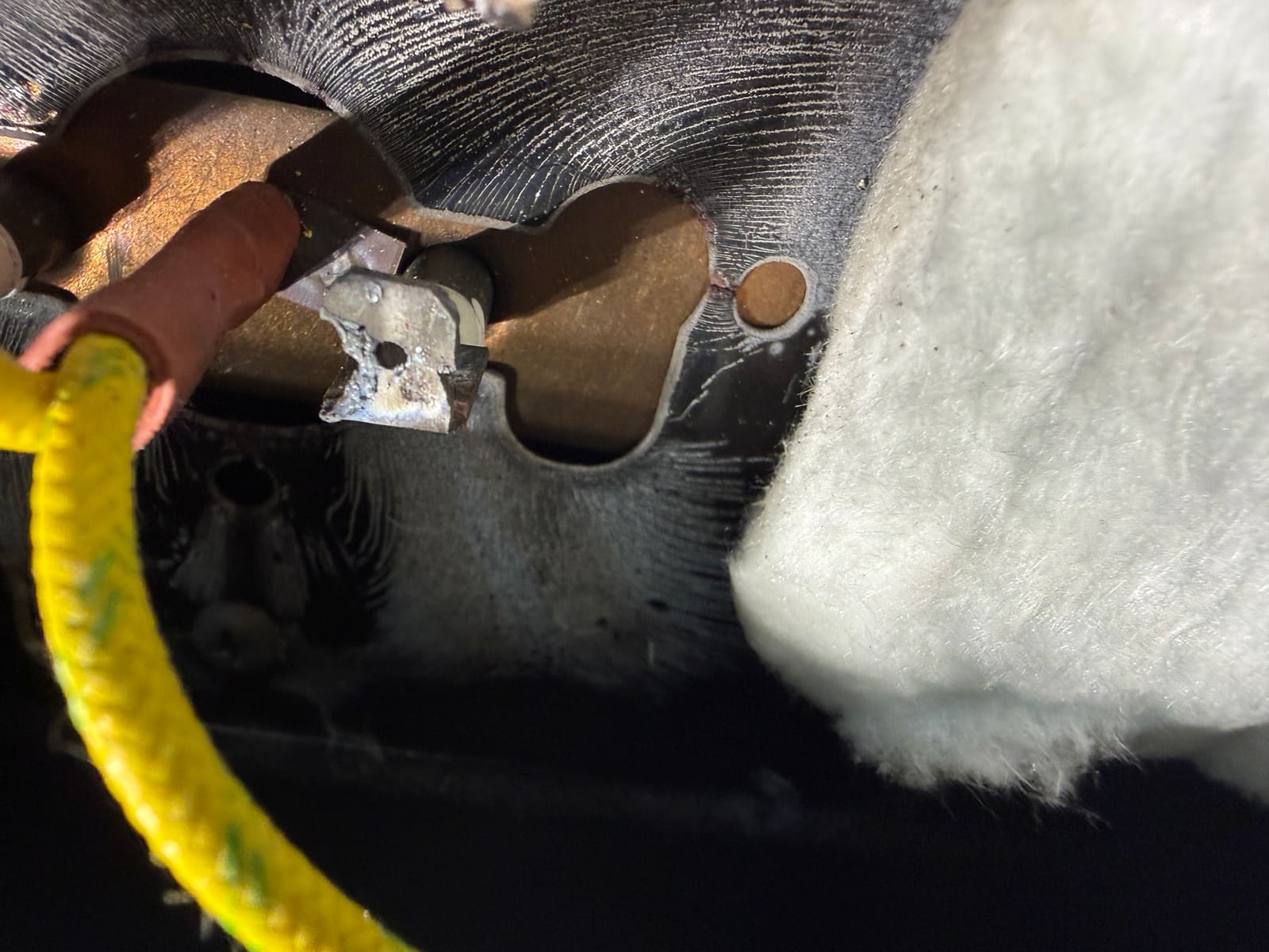 Close-up of a burnt connector terminal on the bake element wiring