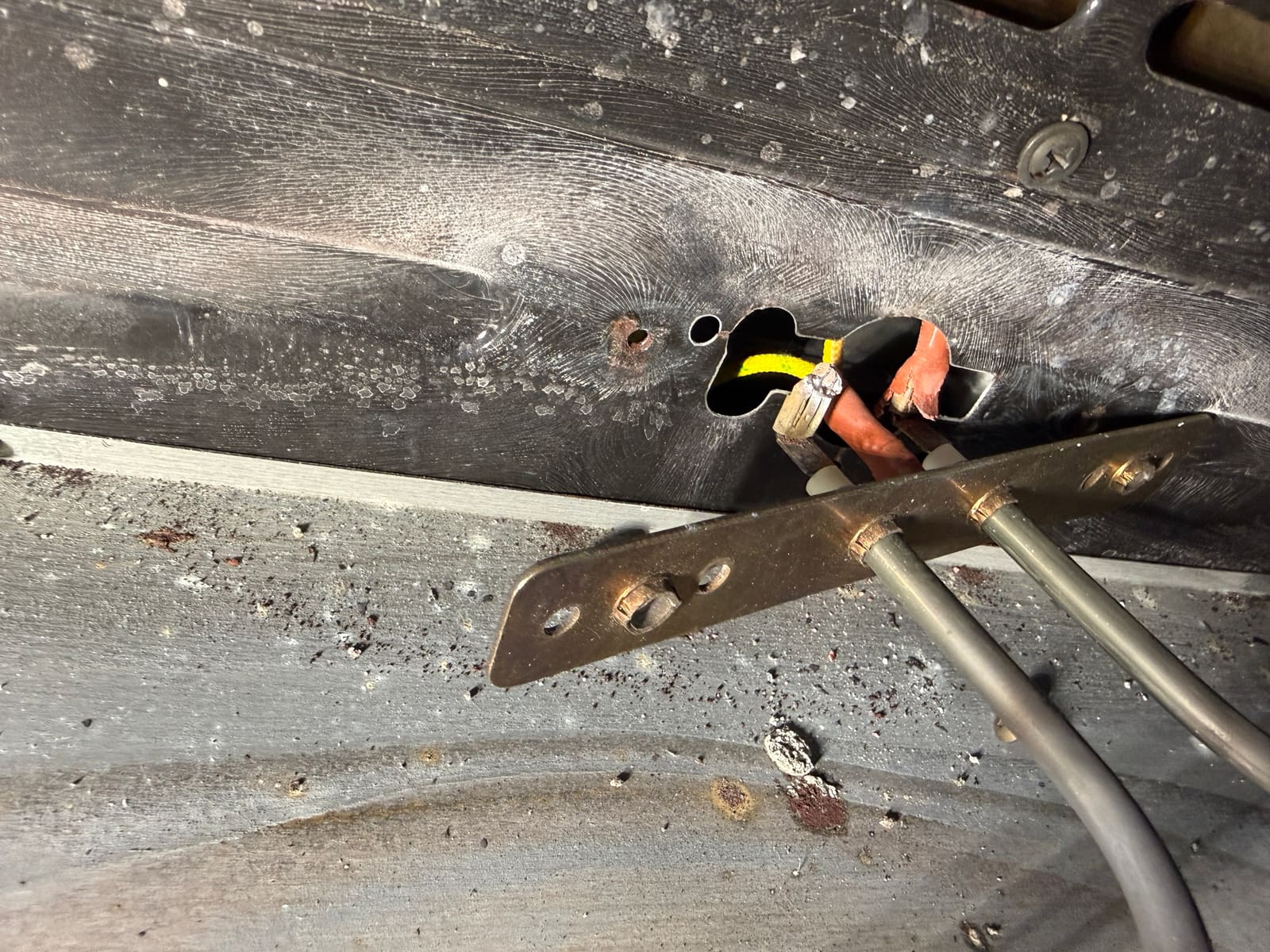 Bake element wiring routed through the rear panel of the range during diagnosis